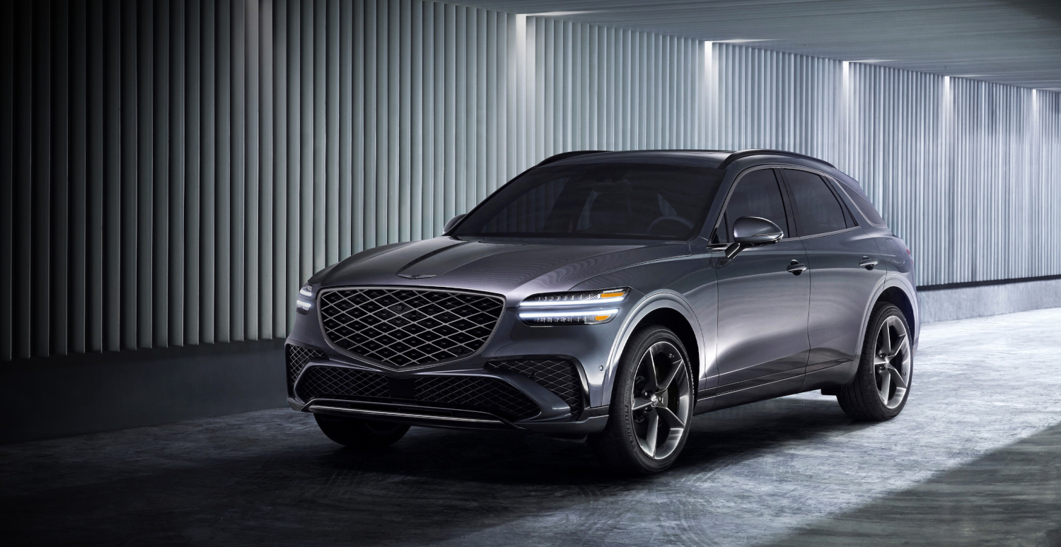 2025 Genesis GV70 in gray, luxury SUV with distinctive grille.